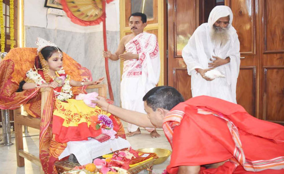 Kumari Puja observed at Anandamoyee Maa Ashram on Maha Asthami.
